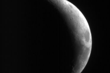 This image shows a crescent view of Earth's Moon in infrared wavelengths.