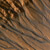 False-color image of gully channels in a crater in the southern highlands of Mars.