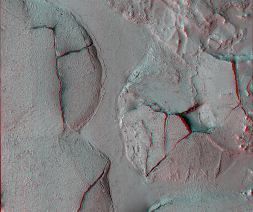 This stereo view shows fractured mounds on the southern edge of Elysium Planitia on Mars.