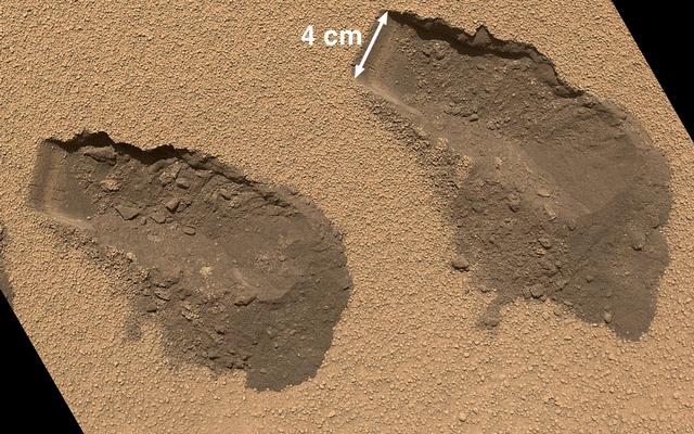 This is a view of the third (left) and fourth (right) trenches made by the 1.6-inch-wide (4-centimeter-wide) scoop on NASA's Mars rover Curiosity in October 2012 