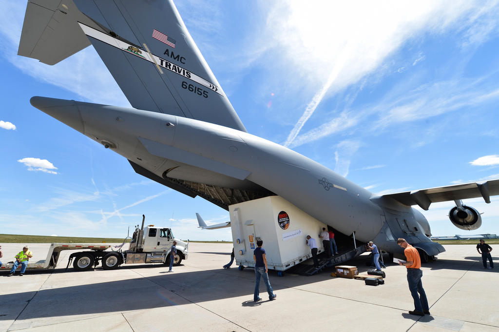 The MAVEN spacecraft is loaded into the belly of a C-17 Globemaster at Buckley Air Force Base in Aurora, Colorado on its way to Cape Canaveral, Florida, where it will be prepared for a November 18th launch date