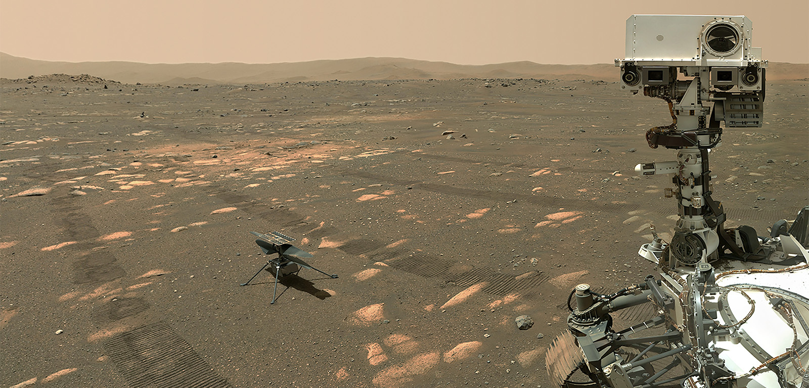 NASA’s Perseverance Mars rover took a selfie with the Ingenuity helicopter on the Martian surface, seen here about 13 feet (3.9 meters) from the rover.