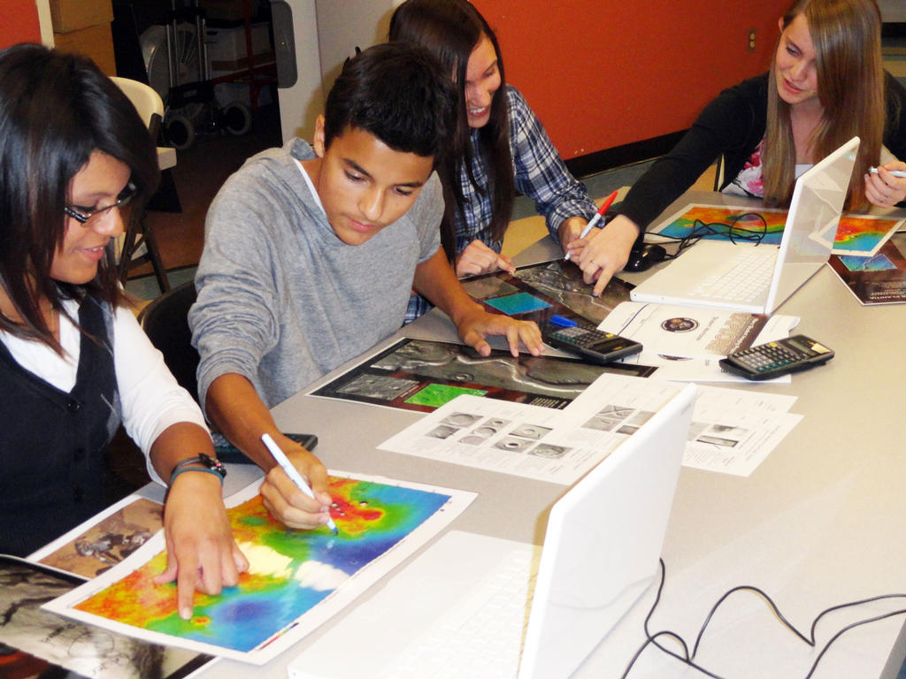 Ninth-grade, high-school students from Peoria, AZ analyze images of Mars.