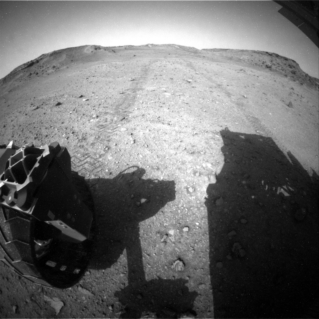Rear hazcam view of the rover's tracks as we leave Shoshone quad.