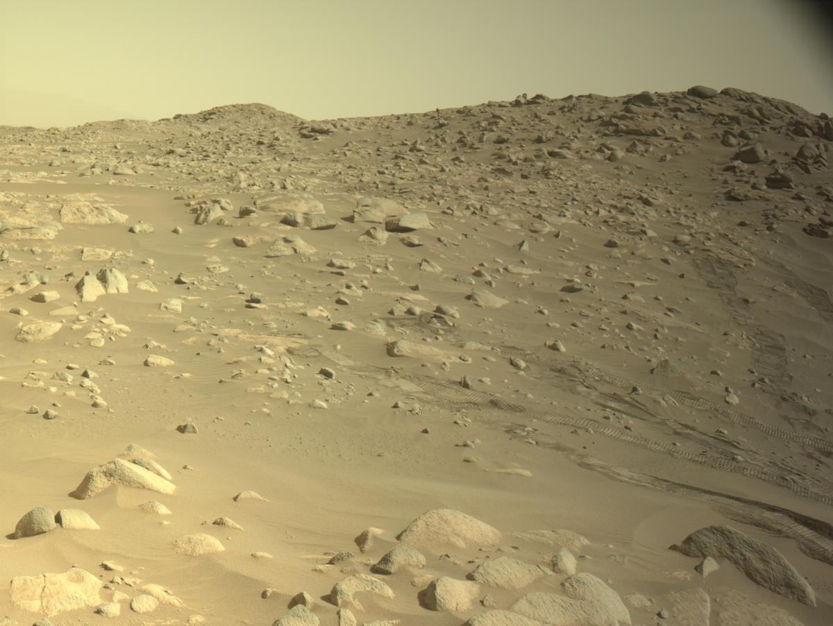 slide 6 - An image of the martian geology on the way to Beheive Geyser. 