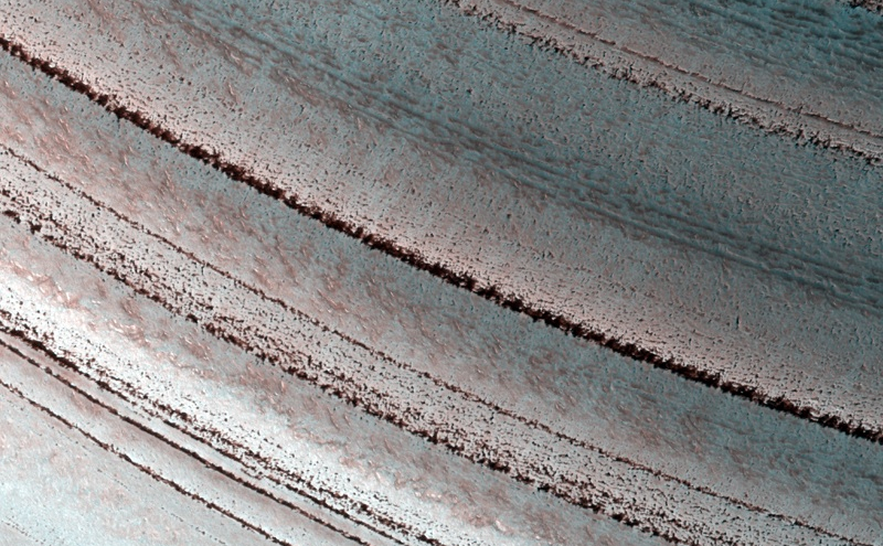 Icy Layers and Climate Fluctuations near the Martian North Pole View Related Images