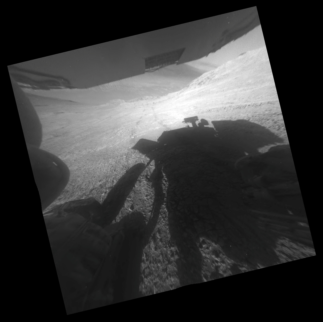 Opportunity's Shadow and Tracks on Martian Slope