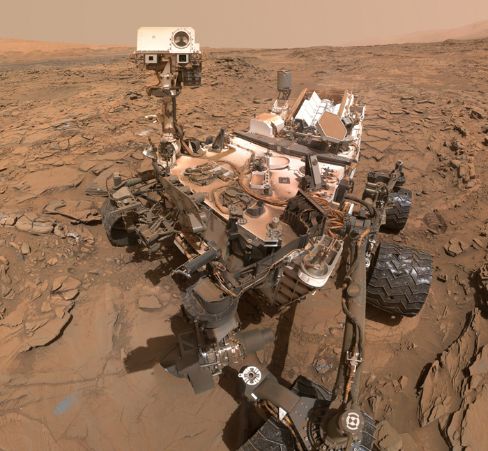 This May 11, 2016, self-portrait of NASA's Curiosity Mars rover shows the vehicle at the "Okoruso" drilling site on lower Mount Sharp's "Naukluft Plateau." The scene is a mosaic of multiple images taken with the arm-mounted Mars Hands Lens Imager (MAHLI).