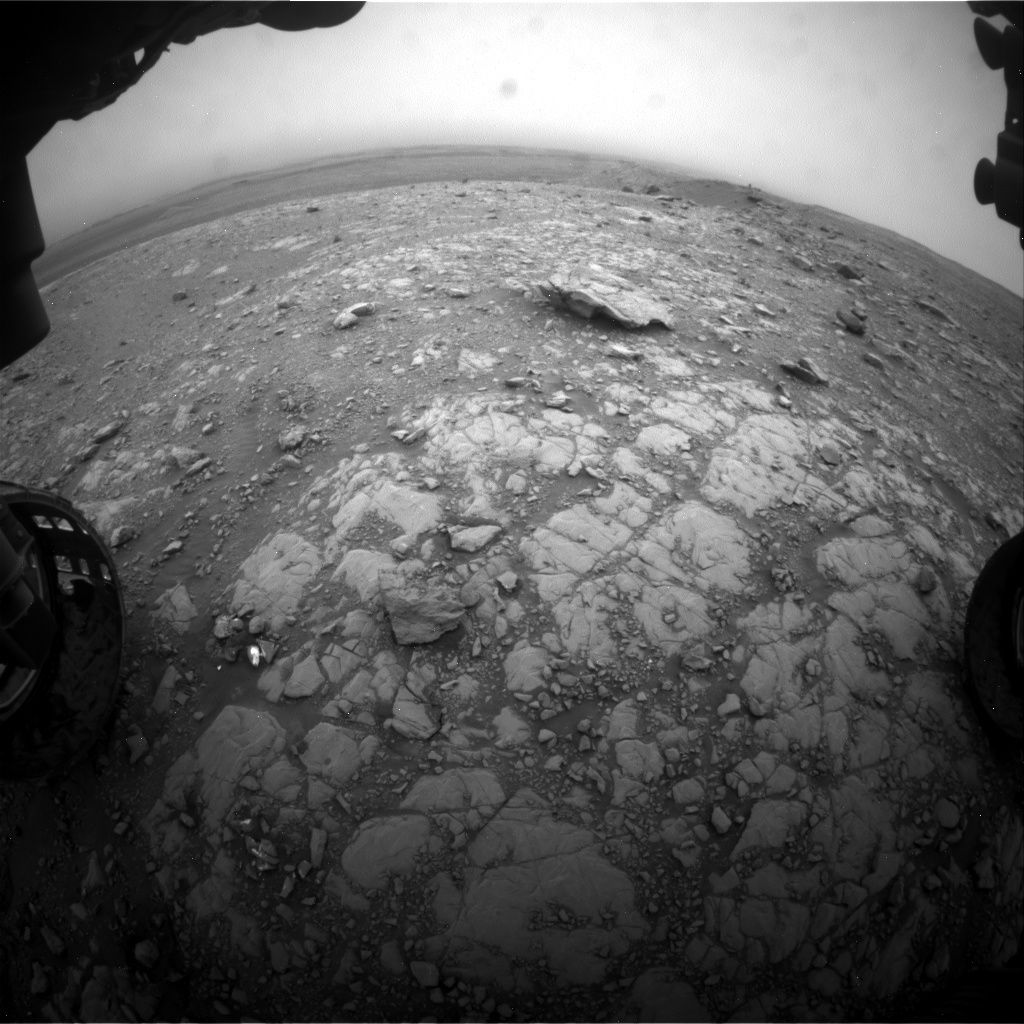 Nasa's Mars rover Curiosity acquired this image using its Front Hazard Avoidance Camera (Front Hazcam) on Sol 2104, at drive 2350, site number 71