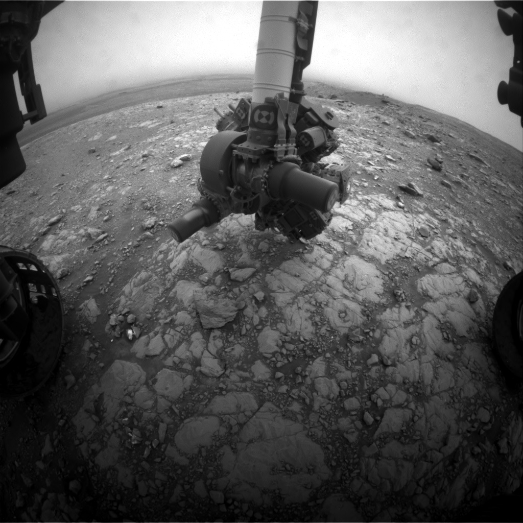 Nasa's Mars rover Curiosity acquired this image using its Front Hazard Avoidance Camera (Front Hazcam) on Sol 2107, at drive 2350, site number 71