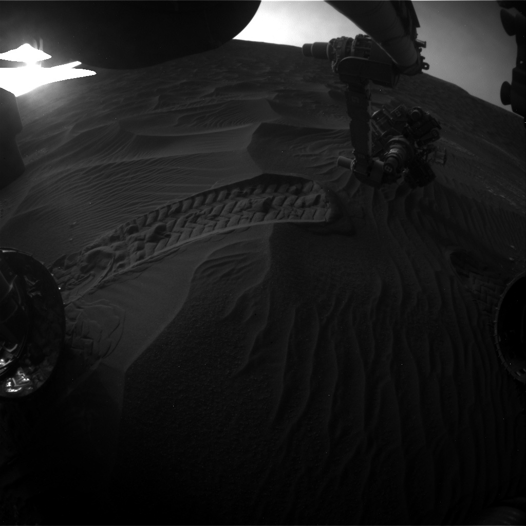 Nasa's Mars rover Curiosity acquired this image using its Front Hazard Avoidance Camera (Front Hazcam) on Sol 2410, at drive 1564, site number 75