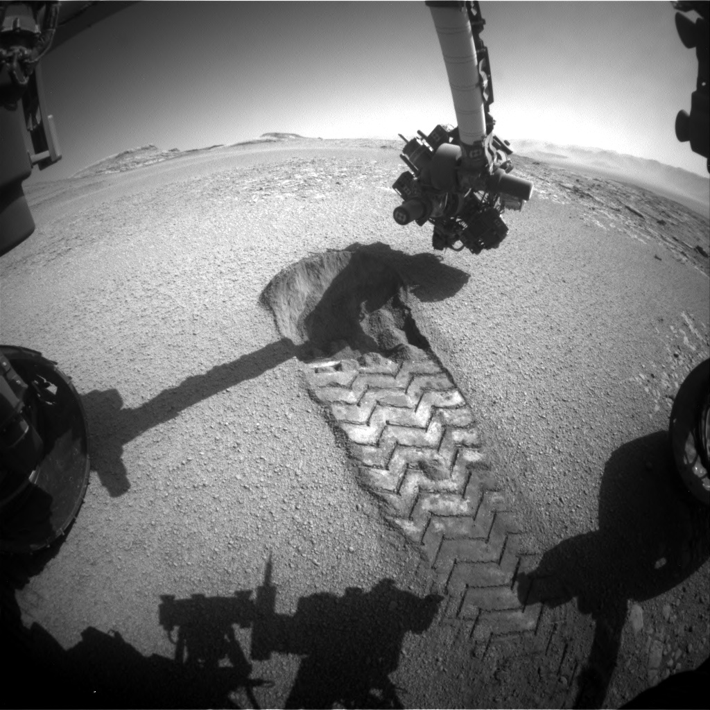 Nasa's Mars rover Curiosity acquired this image using its Front Hazard Avoidance Camera (Front Hazcam) on Sol 2557, at drive 70, site number 77