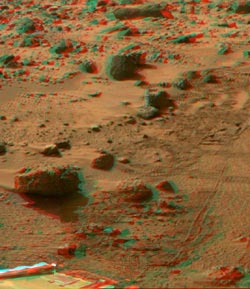 This image shows the area directly in front of the rover egress ramp and around Yogi.