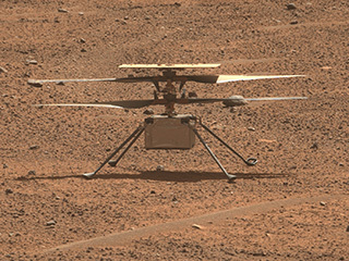 NASA’s Ingenuity Mars Helicopter is seen Aug. 2, 2023, in an enhanced-color image captured by the Mastcam-Z instrument aboard the agency’s Perseverance Mars rover.