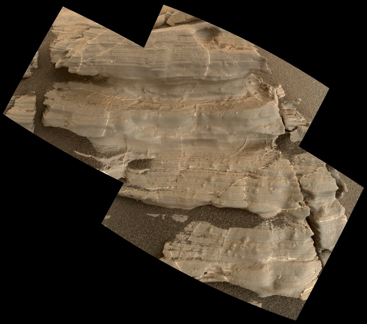 This exposure of finely laminated bedrock on Mars includes tiny crystal-shaped bumps, plus mineral veins with both bright and dark material. This rock target, called "Jura," was imaged by the MAHLI camera on NASA's Curiosity Mars rover on Jan. 4, 2018, during Sol 1925 of the mission. Credits: NASA/JPL-Caltech/MSSS

Full image and caption