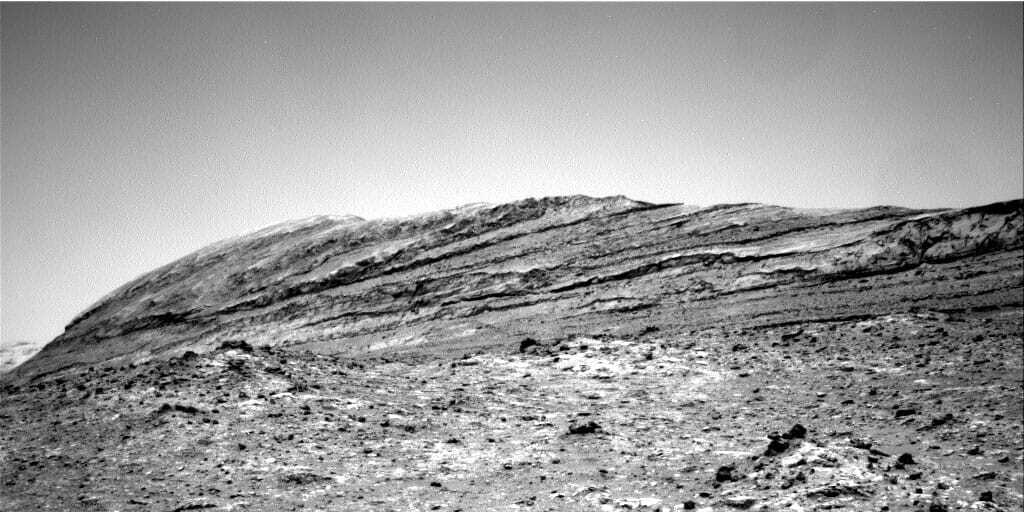 Black and white image of a hillside terrain on Mars.