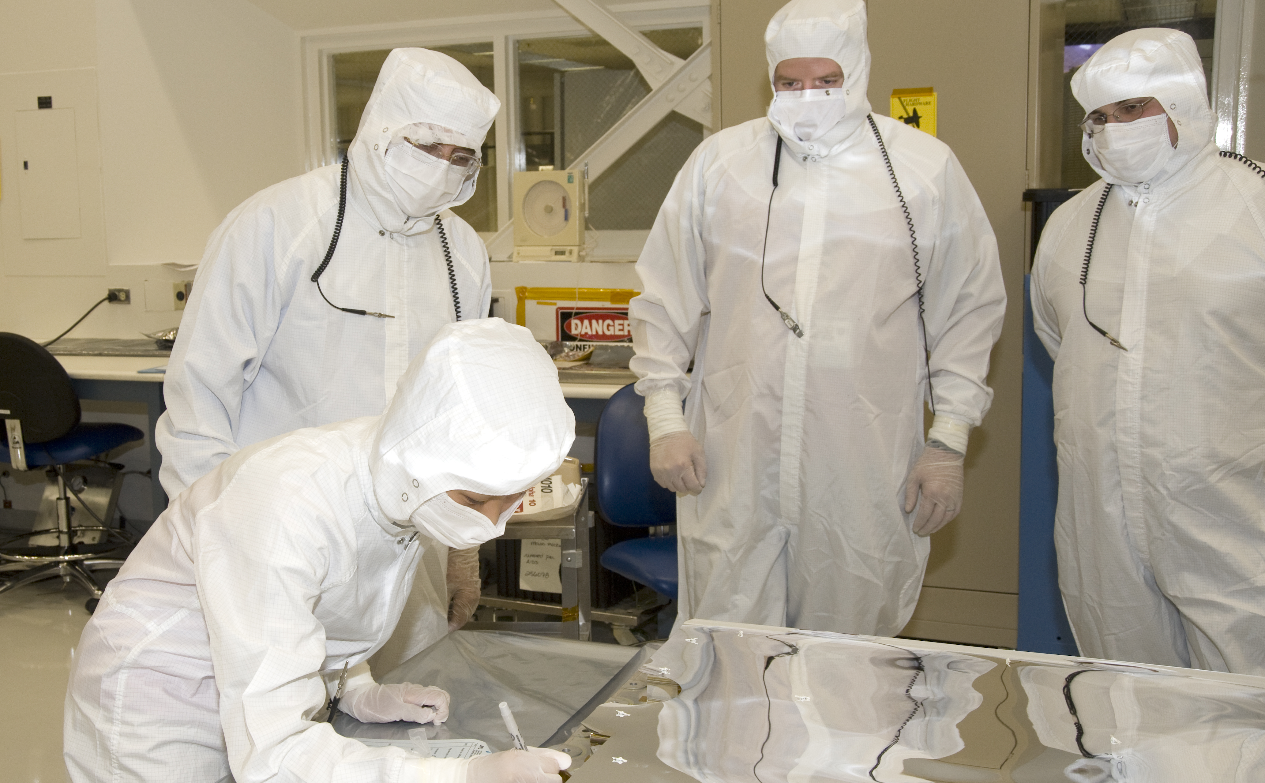 Clara Ma signed the rover on June 8, 2009, inside a cleanroom of the Spacecraft Assembly Facility